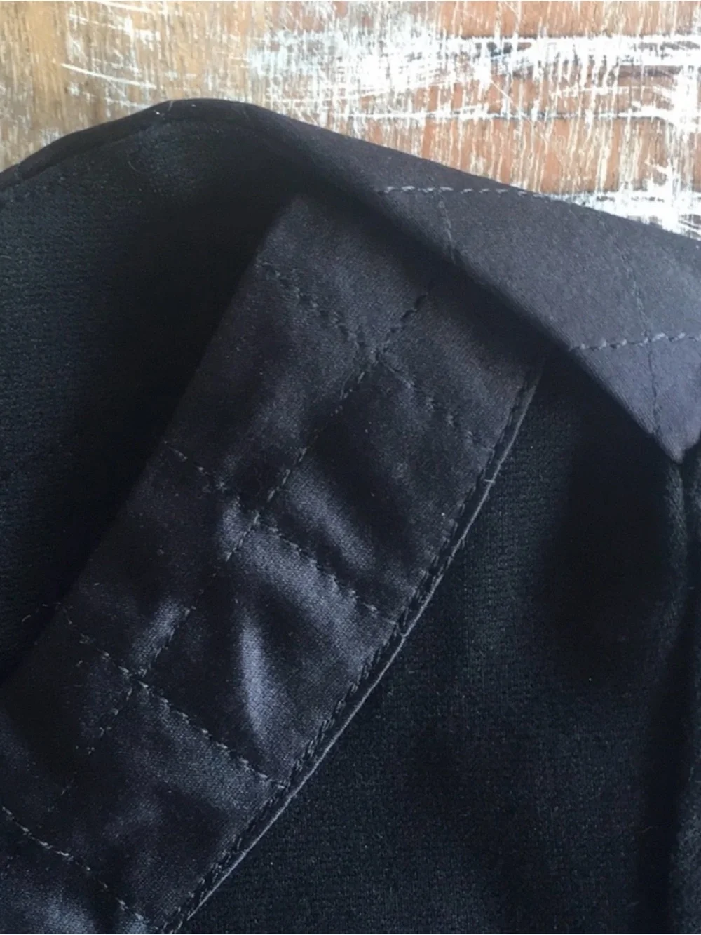 CHANEL black quilted boatneck employee uniform top